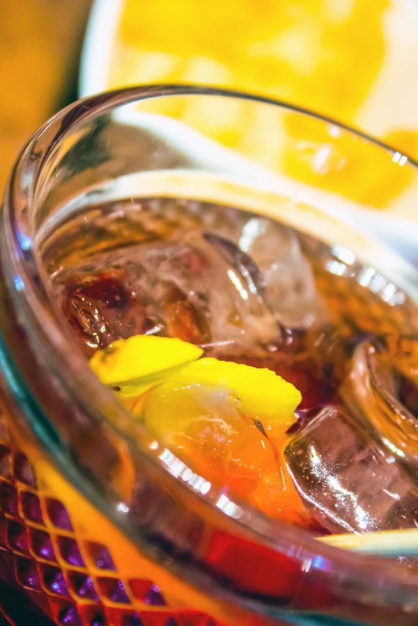 Smoked negroni cocktail with orange peel