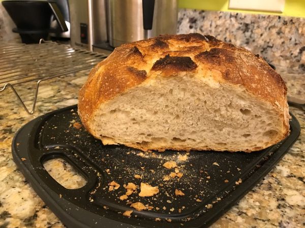 Sliced sourdough loaf with whipped butter